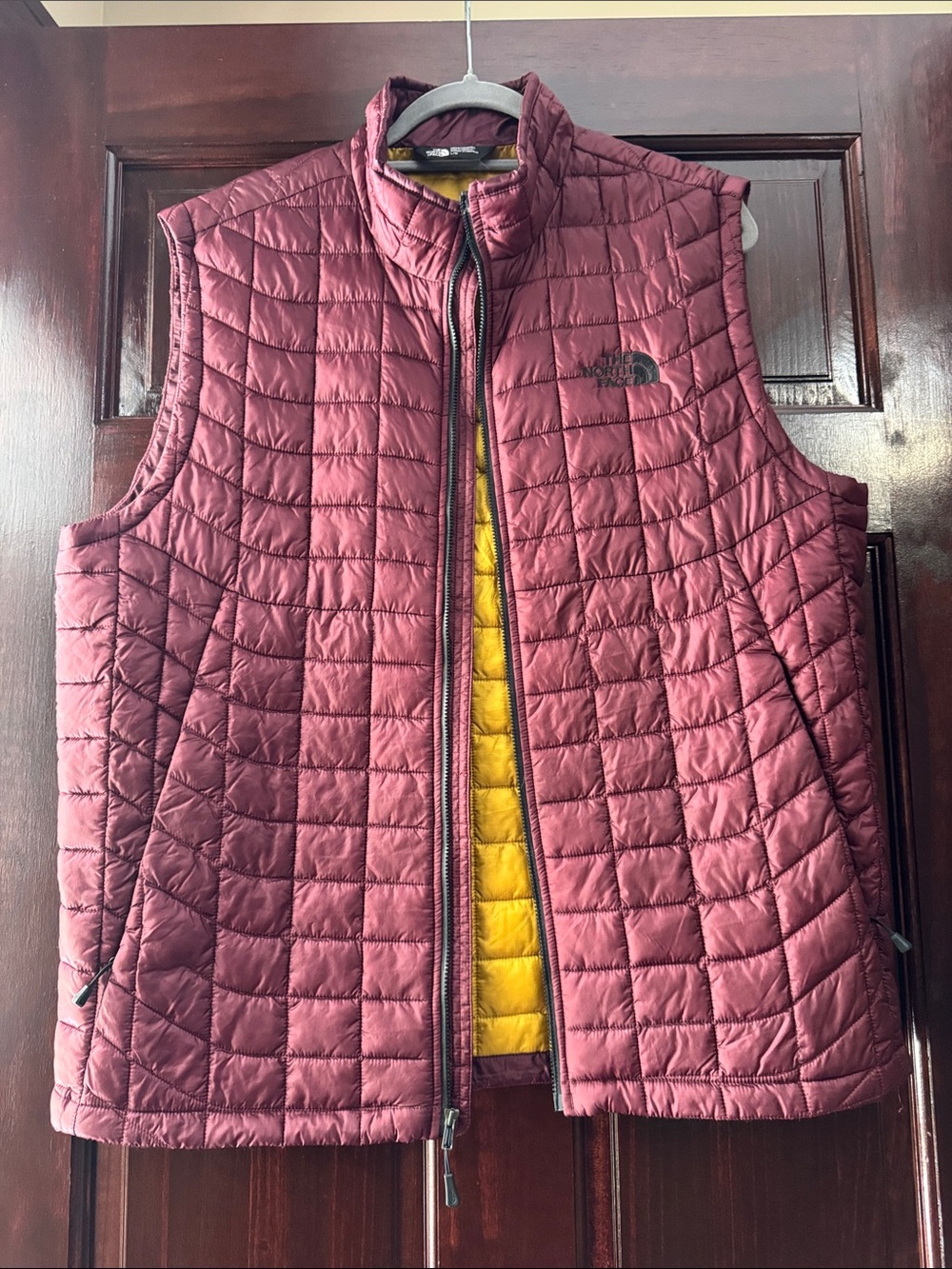 The North Face Men’s Maroon Quilted Vest with Yellow Lining